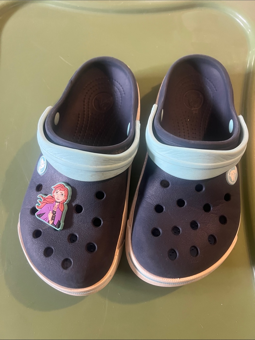 CROCS kids clogs in navy with light blue strap and pink charm